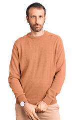 Obraz premium Young handsome man wearing casual clothes depressed and worry for distress, crying angry and afraid. sad expression.