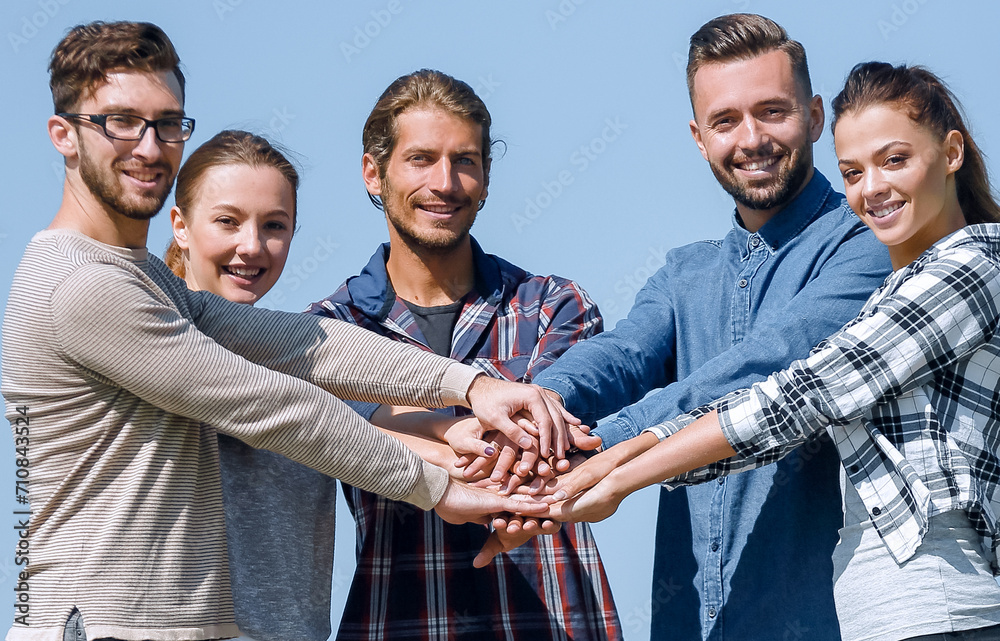 Canvas Prints group of young people clasped their hands together