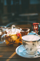cup of tea and teapot on table