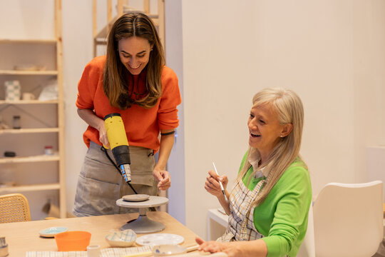 ceramic workshop classes for mature people - drying ceramics with a dryer -