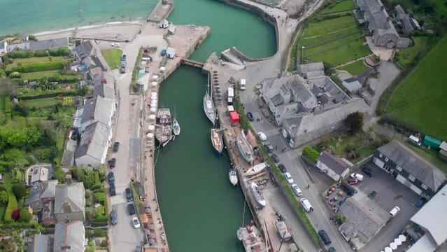 Aerial view of boats along the canals in Charlestown, a village and port on the south coast of Cornwall, England, United Kingdom.