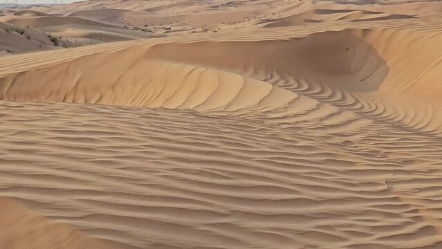 Desert sand with flow force of air HD Video 1080p Dubai UAE natural beautiful images isolated Nice background display colourful beauty scenery Great Views HD Video