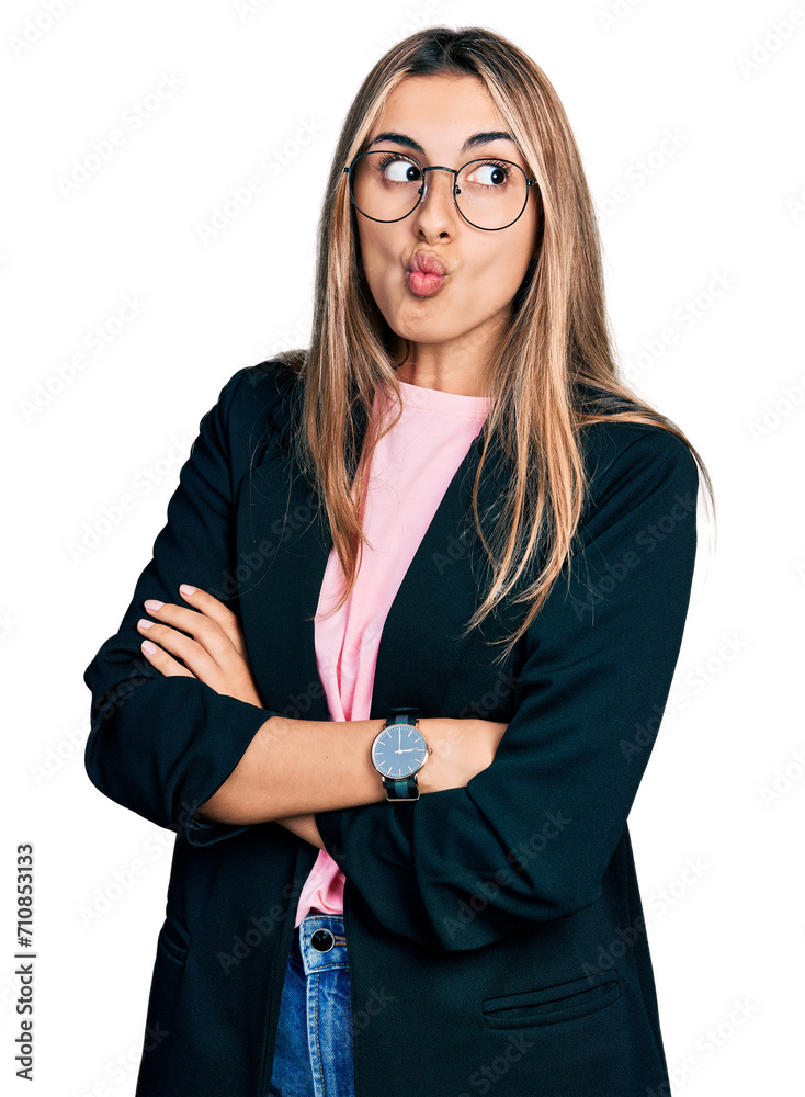 Sticker Hispanic young woman with arms crossed gesture making fish face with mouth and squinting eyes, crazy and comical.