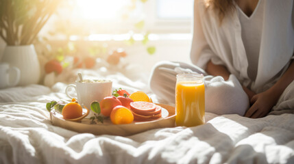 Obraz na płótnie Canvas Morning Indulgence: Relaxing Breakfast in Bed with Fresh Juice, Croissant, and Coffee - Cozy Home Lifestyle Banner