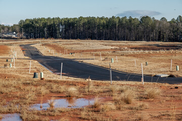 New home residential subdivision development of blacktop roads and curbs