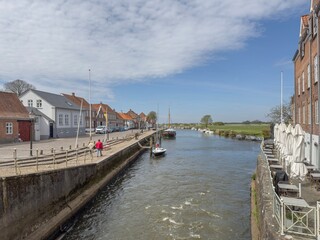 Fototapeta premium Wanderlust in street Ribe city, Ribe is a town in Esbjerg municipality in Region Southern Denmark