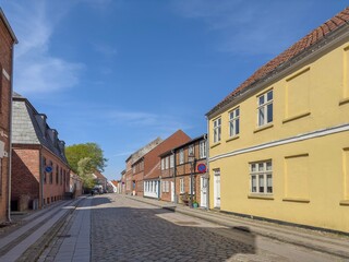 Wanderlust in street Ribe city, , Ribe is a town in Esbjerg municipality in Region Southern Denmark