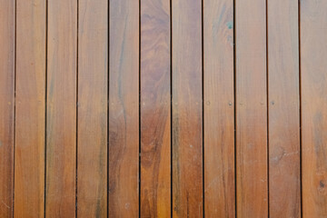 background of lined up wooden clubs