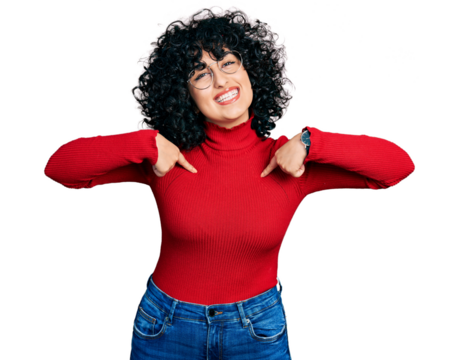 Young middle east girl wearing casual clothes and glasses looking confident with smile on face, pointing oneself with fingers proud and happy.