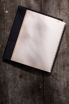 Blank notebook with grid pages
