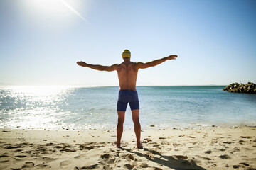 Ocean, beach and sports man for swimming exercise, nature workout or outdoor practice in water, sea...