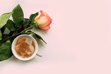 Floral arrangement with tea roses and a cup of coffee. Concept for Valentine's Day or Women's Day,...
