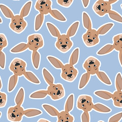 Flat seamless pattern of kangaroo heads on a blue background