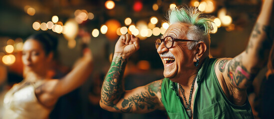 70 year old senior with green hair, tattoos and earrings dancing in a bar. Blurred background.