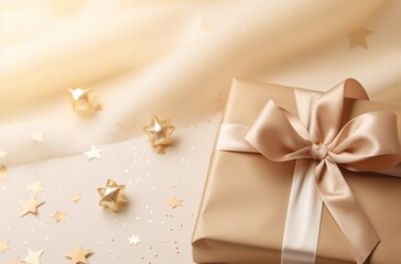 Fototapeta na wymiar christmas decorations, wrapping paper and gold bows on a beige background,