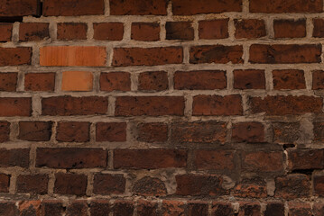 Red grunge brick wall, abstract background texture