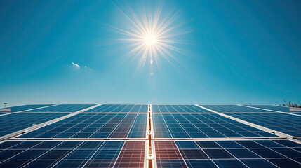 Solar panels with the sun shining brightly above. Clean and modern energy concept.