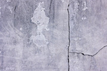 Concrete wall with a crack. Concrete texture.