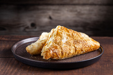 Chicken puff pastry. Baked puff pastry stuffed with chicken.