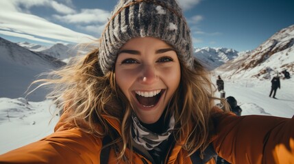 Fototapeta na wymiar Ecstatic young woman on a snowy mountaintop