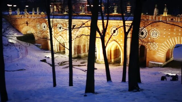 Illuminated walls near Tsaritsyno Palace at winter evening 