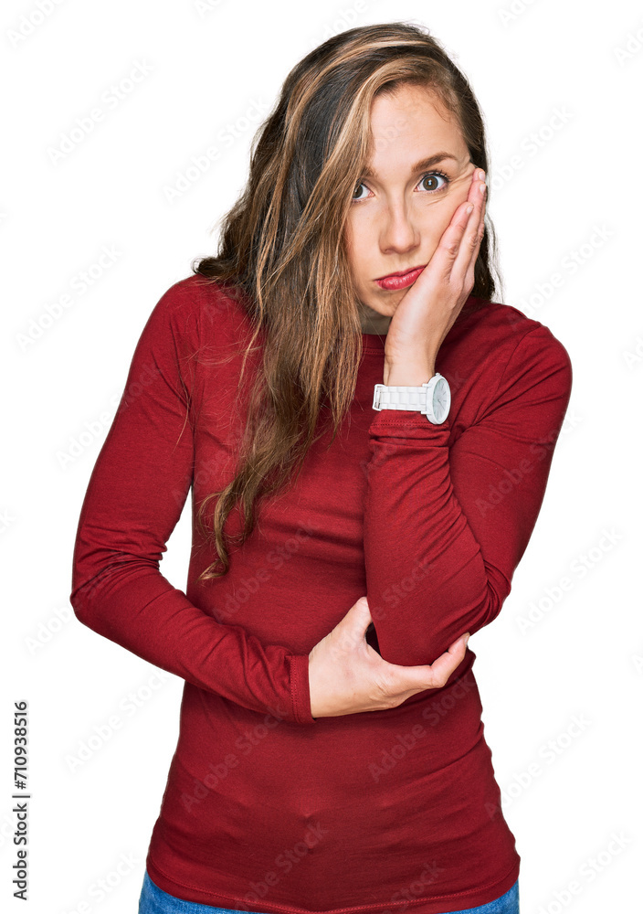 Sticker Young blonde woman wearing casual clothes thinking looking tired and bored with depression problems with crossed arms.