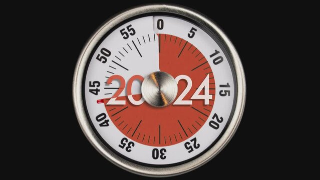 TIME FOR ACTION!! Kitchen vintage old analogue egg timer counting down to the end of 2024, beginning of 2025. A year has passed countdown. Happy New Year!!!