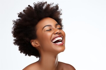 Young laughing african american woman on white background