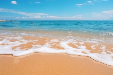 Fototapeta premium Tranquil Close-up of Soft Waves on Sandy Beach, Creating a Serene and Calming Atmosphere