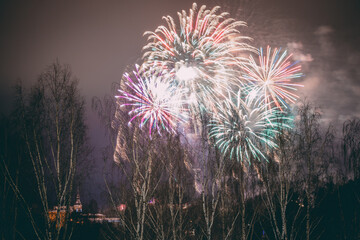 Fireworks. Colorful lights fly up in the New Year. Happy New Year! Atmospheric distortion, hot air...