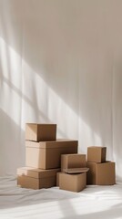 boxes in a pile on a white floor, in the style of minimalist,beige tones