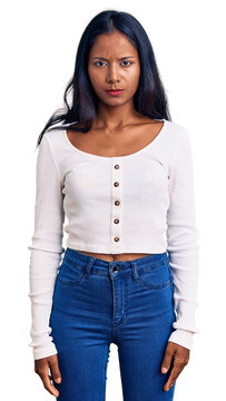 Young indian girl wearing casual clothes depressed and worry for distress, crying angry and afraid. sad expression.