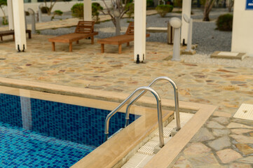 Swimming pool with blue water in a residential complex 1