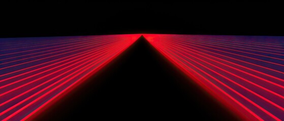 A wide-angle view of vibrant red light rays converging in the darkness