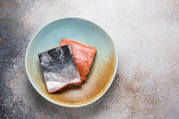 Pieces of smoked salmon on a plate. Close-up