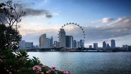 Singapore city skyline with Singapore Flyer at the sunset, February 2019