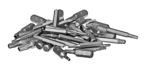 Close-up a pile of steel screwdriver bits of different type and size isolated on a white...
