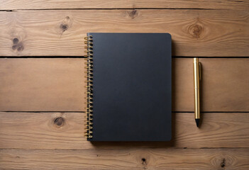Black cover and gold spiral coil notebook isolated on rustic wooden table with plenty of copy space. - obrazy, fototapety, plakaty
