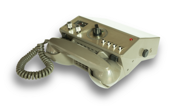 Shadow under a CB radio with old fashioned telephone receiver