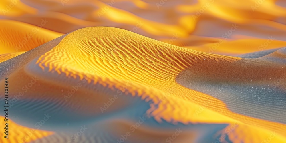 Poster a detailed view of a sand dune in the desert. this image can be used to depict the vastness and beau