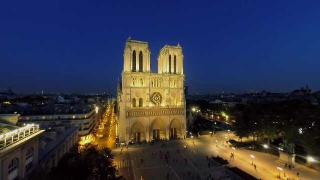 Cityscape with crowd of people walk near Cathedral Notre Dame