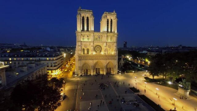 Cathedral Notre Dame de Paris on square with many people