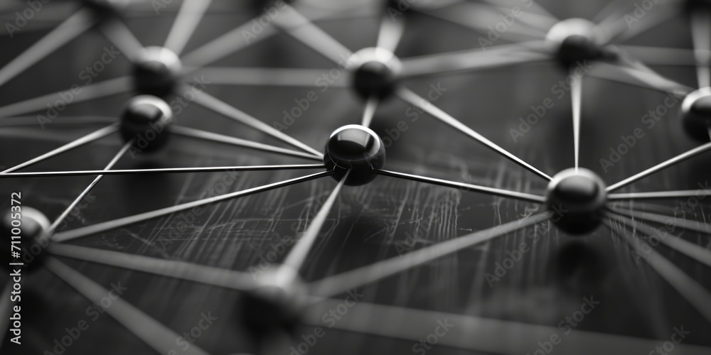 Poster A captivating black and white photo featuring a network of spheres. This versatile image can be used in various design projects