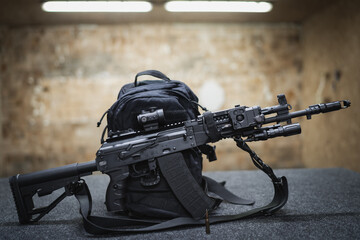 Tactical weapon, ak 12 assault rifle with modern equipment in a shooting range, close-up photo