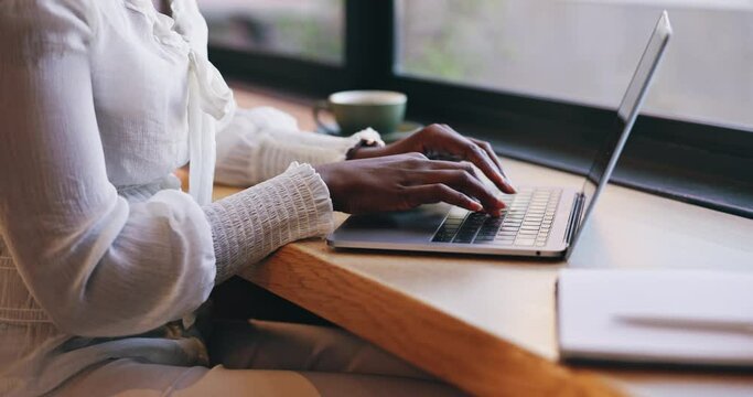 Woman, coffee shop and typing on laptop, hands and remote work for business, write email and freelancer. Businesswoman, employee and technology for writing career, copywriter and working as creative