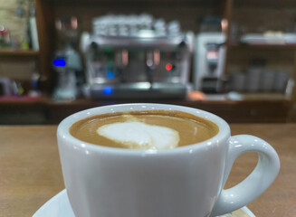 Coffee cup served over bar counter