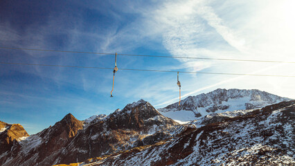 ski lifts hanging on the piste