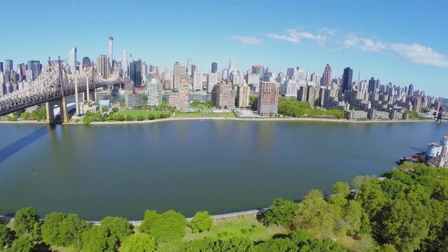 Cityscape with Queensbridge over East River and Manhattan skyscrapers