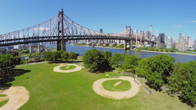 Queensboro Bridge near sports playground in Queensbridge Park