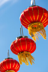 Asian Chinese Lantern on Chinese New Year's Day - 4K Ultra HD Image Against Blue Sky